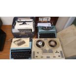 A fidelity Playmaster twin track, three typewriters; Remmington Ten Forty, Silver Reed SR 180 and