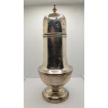 A silver sugar castor, Birmingham 1915, of baluster form, 20 cm, 7 oz.