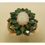 A 9ct gold opal and emerald cluster ring, 3 gms, size M1/2.