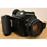 A Pentax 645 camera with F8 75 mm lens.