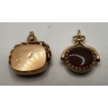 A 9ct rose gold swivel seal, Birmingham 1900, set with bloodstone and plain gold, and another 9ct