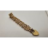 A 9ct gold four bar gate bracelet, 9.5 gms.