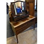 An Edwardian mahogany inlaid 2 piece bedroom suite comprising wardrobe with central mirror on door