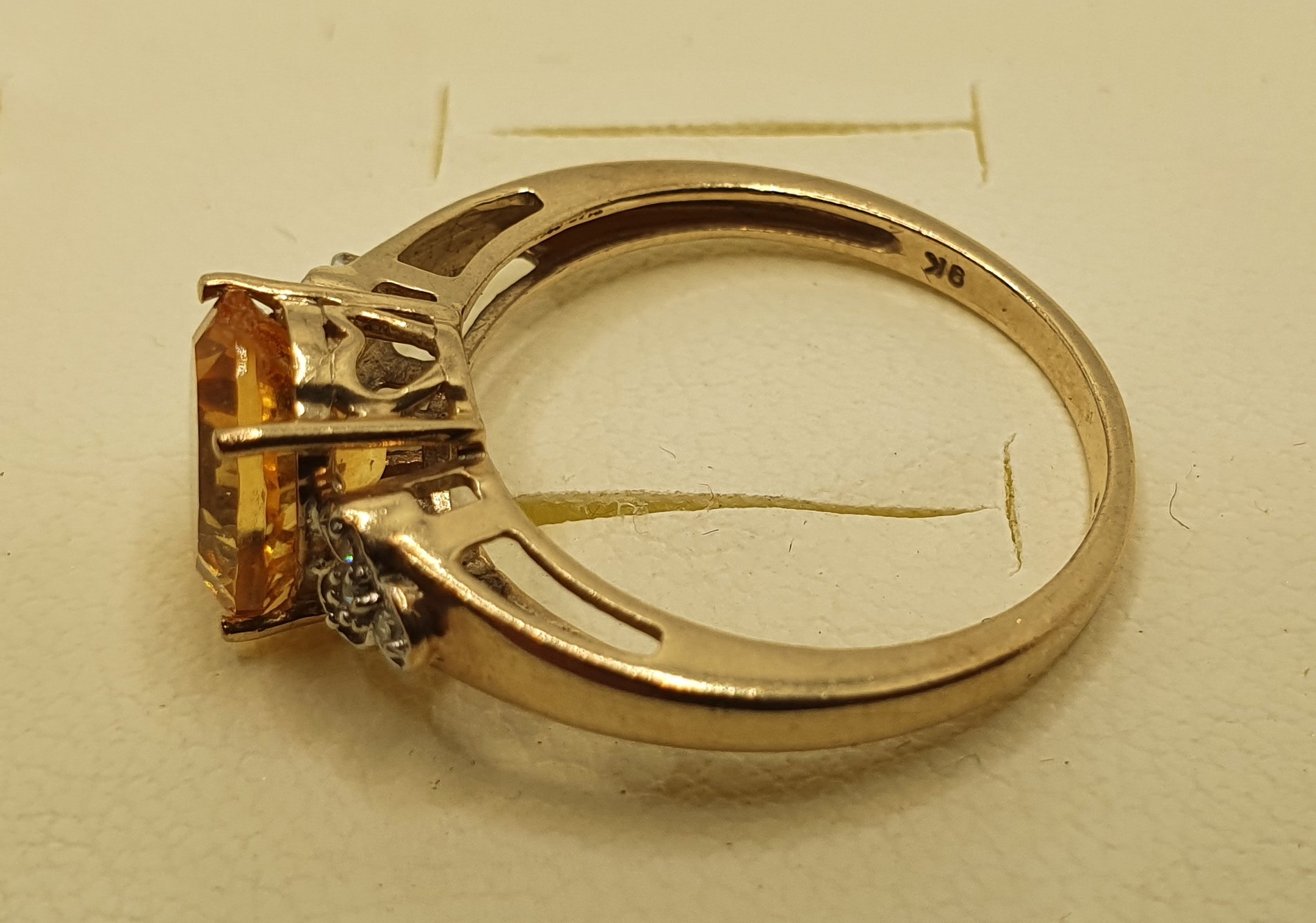 A 9ct gold citrine (chipped) and diamond ring, 2.5 gms, size O1/2. - Image 3 of 3