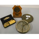 An 18th century style sundial/compass in brass mount, diameter 10.5 cm, an Edwardian Skegness