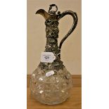A Victorian cut glass and electroplated claret jug, with grape decoration.