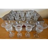 A suite of glassware, comprising three sets of eight glasses.