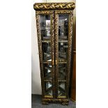 A gilt and black mirrored 4 glass shelf illuminated corner display cabinet. 175 cm high x 53 cm