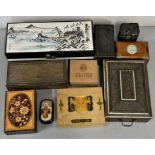 A collection of wooden boxes and jewellery boxes.