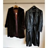 A German black leather overcoat and a ladies full length fur coat. (2)