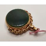 A 9ct rose gold swivel seal, Chester 1920, set with bloodstone and cornelian, diameter 22mm.