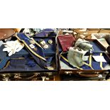 A collection of Masonic regalia, to include 6 cases with aprons and two boxes of aprons.