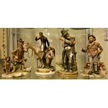 Four Capodimonti figures, huntsman with a dog and chicken, knight on horse with a man, bearded man