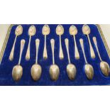 A silver set of twelve coffee spoons, Sheffield 1917, cased.