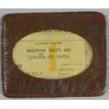 A L.M.S. leather season ticket holder, with L.M.S. 1st class season ticket, no 144, Moss Park (West)