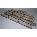 A collection of sixteen Double O gauge carriages (16).