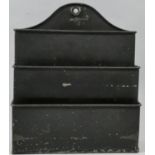 A metal letter rack or document rack, stamped Caledonian, 28 x 23 cm.