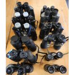 Fifteen pairs of binoculars, cased/uncased to include Tasco, Prinz, Miranda, and Zenith.