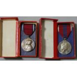 A 1910 - 1935 Silver Jubilee medal and a 1953 Coronation medal, both cased.