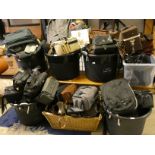 A very large collection of empty camera bags
