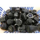 A collection of camera lens, to include Hoya, Olympus, Sigma, Pentax and Canon, approximately 25.