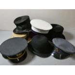 A selection of hats including two Top Hats, Bowler, Fez, Straw Boater, RAF & Navy hats.