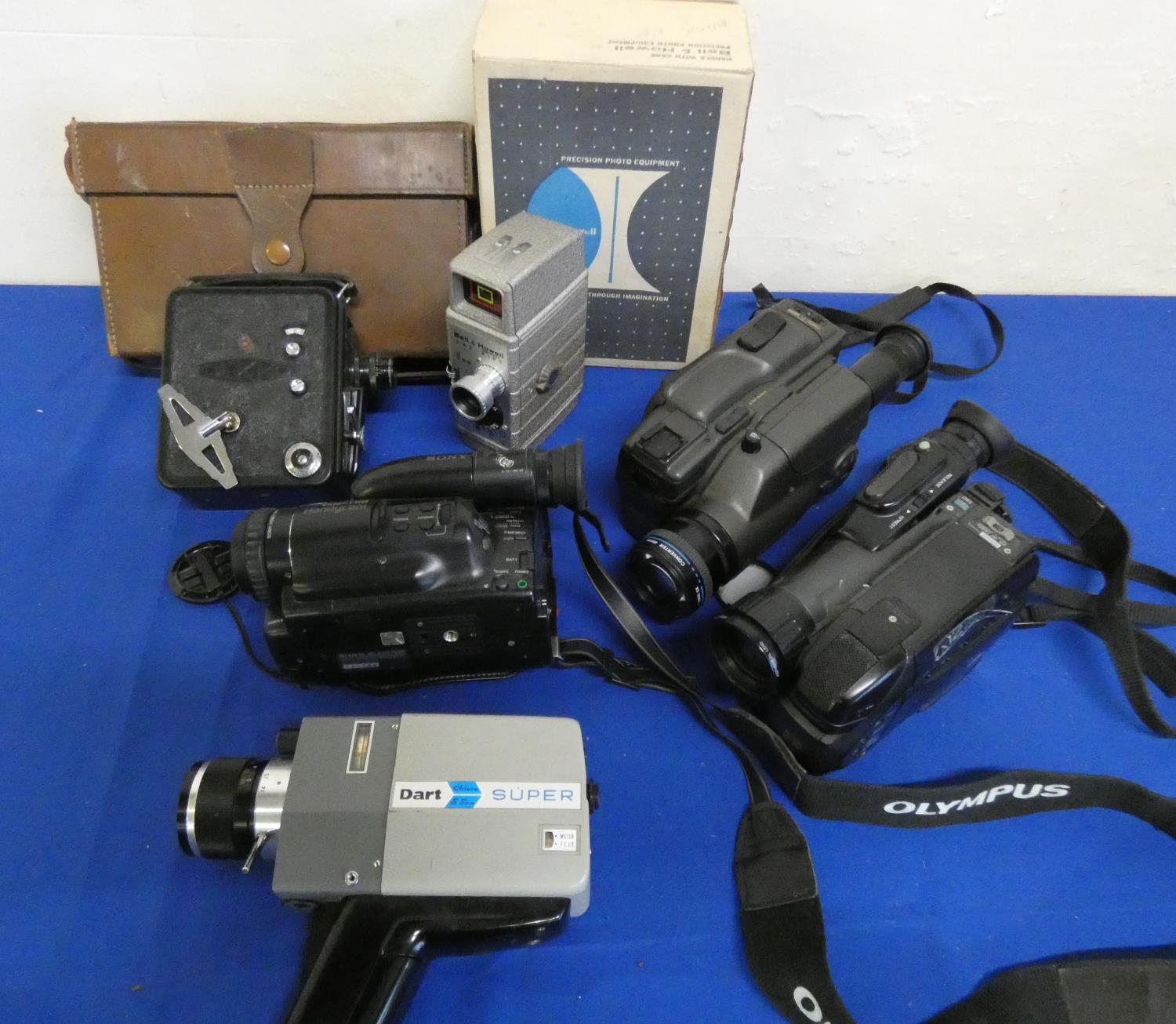 A quantity of cased cine cameras including Minolta, Sony, Sanyo, Dekko, Miranda and Bell & Howell.