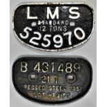 Two cast iron D-shaped wagon plates, LMS 12 tons, 21 tons, and pressed steel 1958.