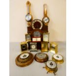 A collection of barometers, carriage and mantle clocks.