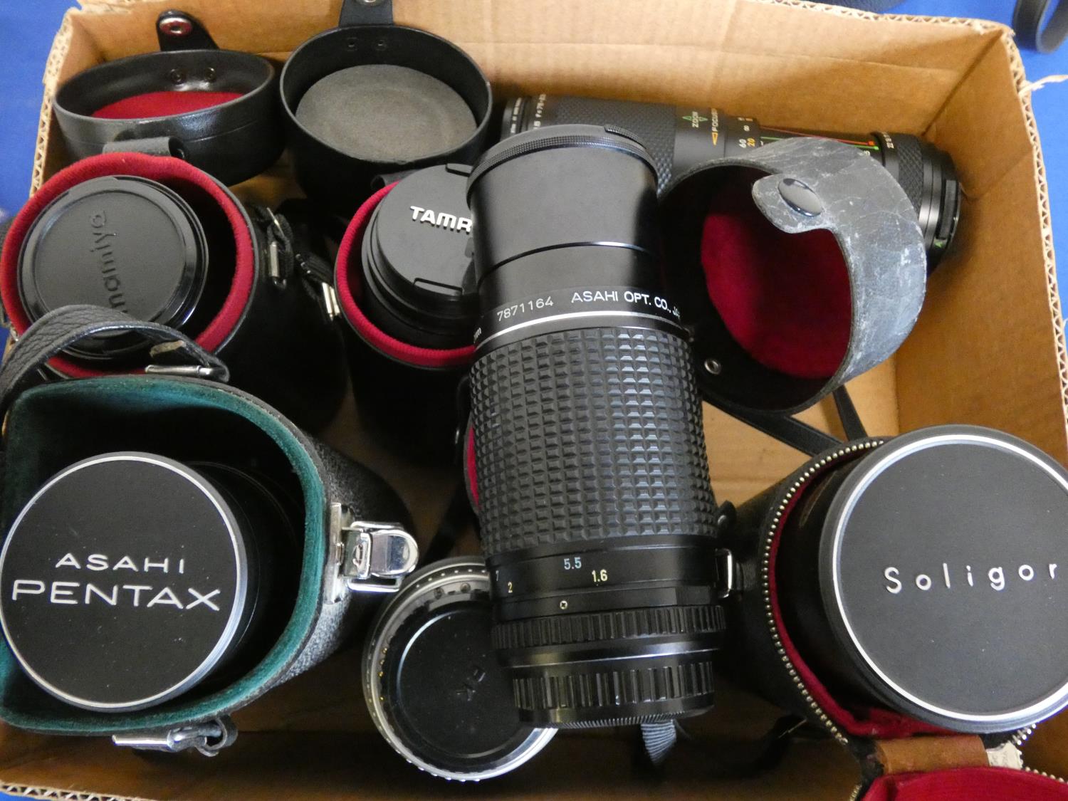 A quantity of camera lens, to include Tamron 750150, Lele Macro, Pentax 80-320, Pentax M zoom 80-