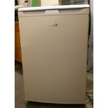 A Beko free standing larder fridge 84 cm tall 54 cm wide.