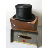 A top hat from Austin Reed, Regent street, London, complete with bespoke box, interior diameter 16cm