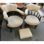 A pair of mahogany framed tub chairs, turned spindle back supporting upholstered arm and upper