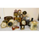 A collection of carriage, alarm, anniversary, and mantle clocks in two boxes (2).