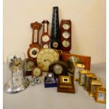 A collection of carriage, anniversary, mantle clocks, and barometers.