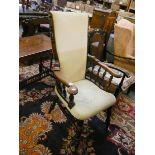 A rush seated ladderback rocking chair and a Victorian upholstered mahogany armchair (2).