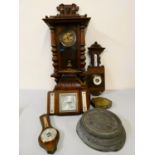 A mahogany cased wall clock, oak cased barometer, together with other barometers.