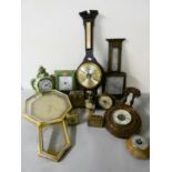 A collection of barometers, mantle clocks and wall clocks.