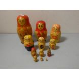 Russian Semenov nesting dolls, set of eleven, and a miniature doll.