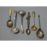 A pair of silver sauce ladles, Sheffield 1938 and 4 other silver spoons.