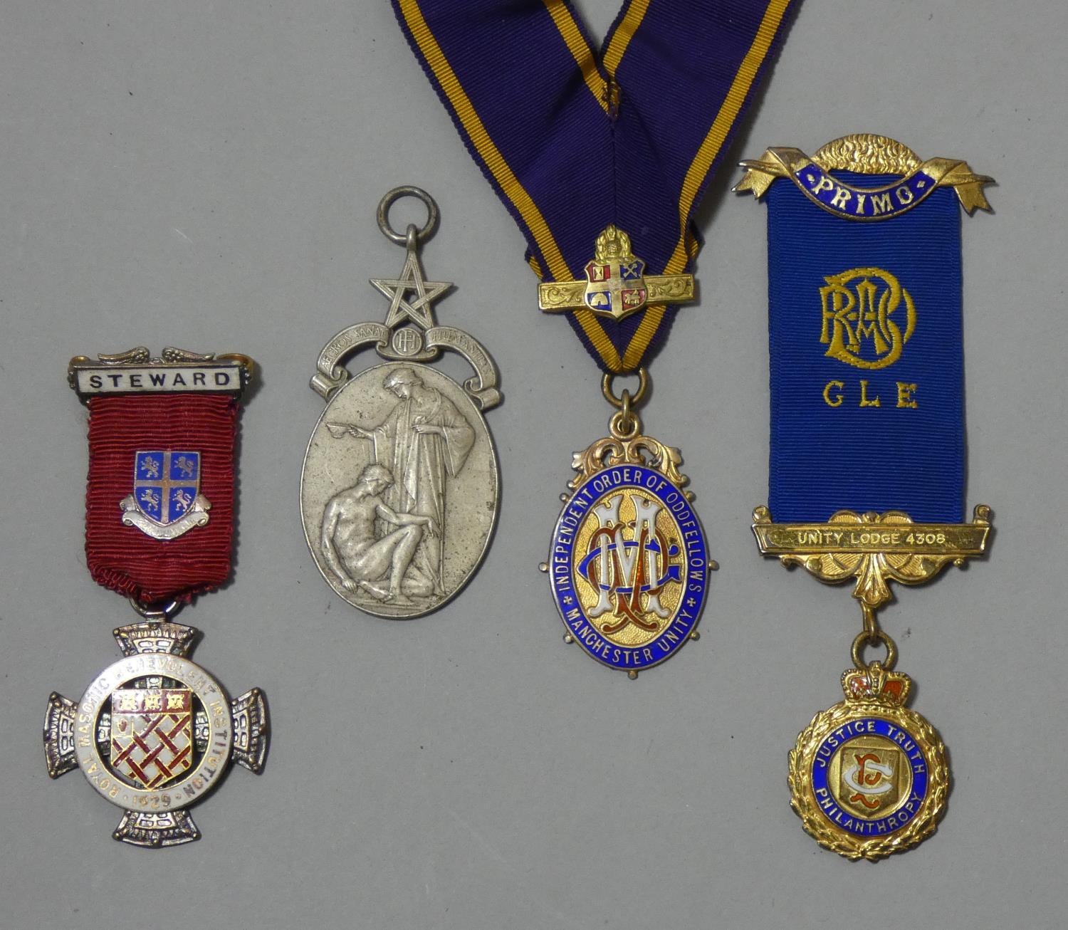 Four silver and silver gilt Masonic jewels.