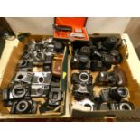 A large quantity of cameras and camera bodies, to include, Exakta 'varex II', Yashica TL-Super,