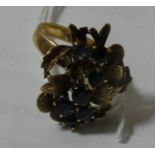 A 14k gold sapphire set dress ring, 5.5 gms.