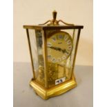 A hexagonal brass cased Kundo mantle clock, together with a Kundo anniversary clock. (2)