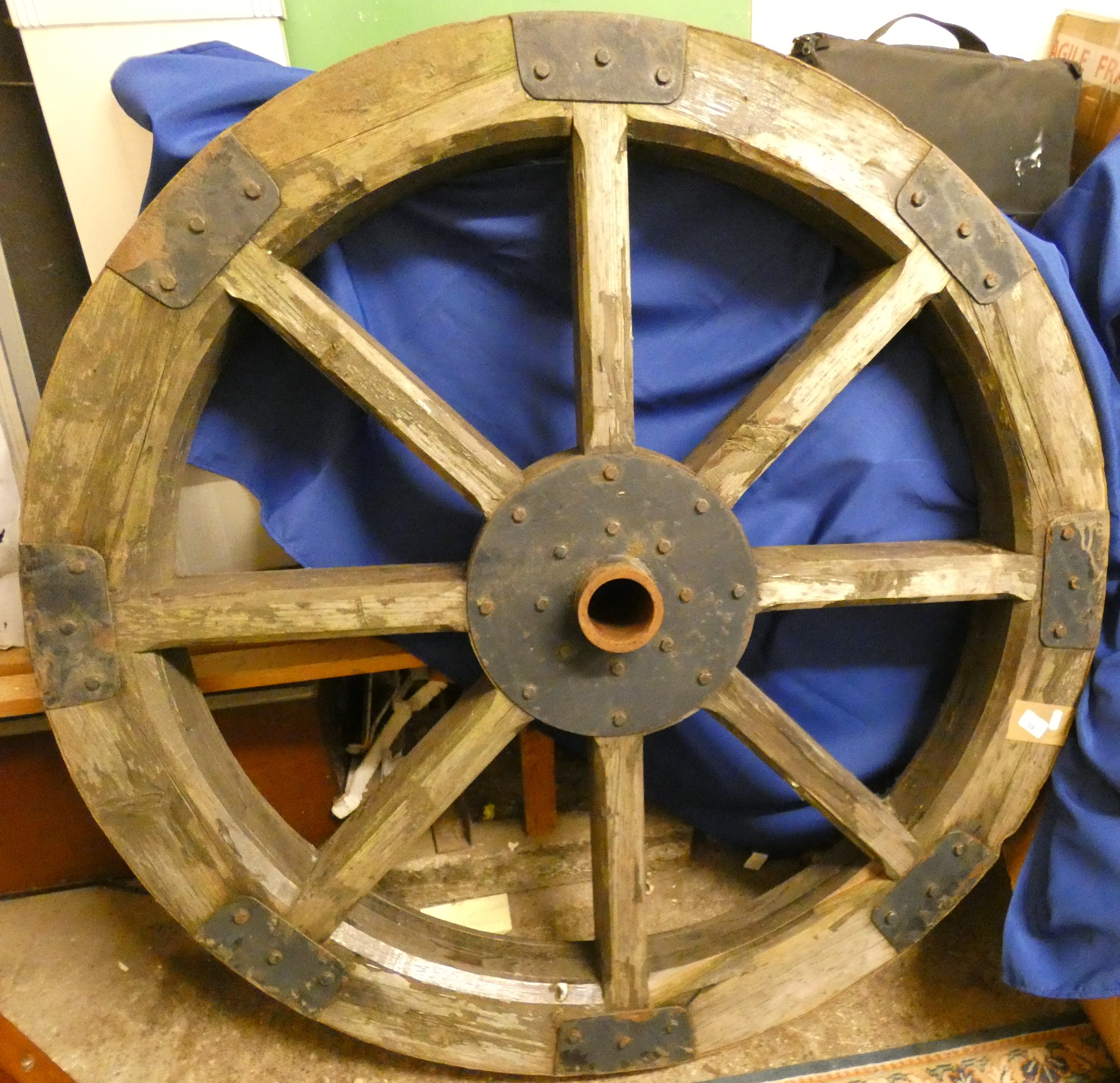 A substantial horse cart wheel. 124 cm diameter (very heavy)