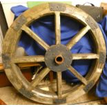 A substantial horse cart wheel. 124 cm diameter (very heavy)