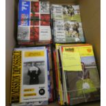 A box of miscellaneous ephemera including, early O.S maps, football programs - Enfield,