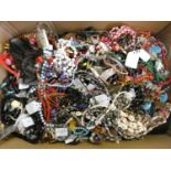 A large box of costume jewellery