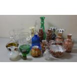 A box of coloured glassware including 3 pairs of vases, baskets, etc and a pair of clear etched