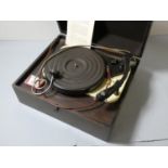 An early HMV oak cased portable record player. model number 119.